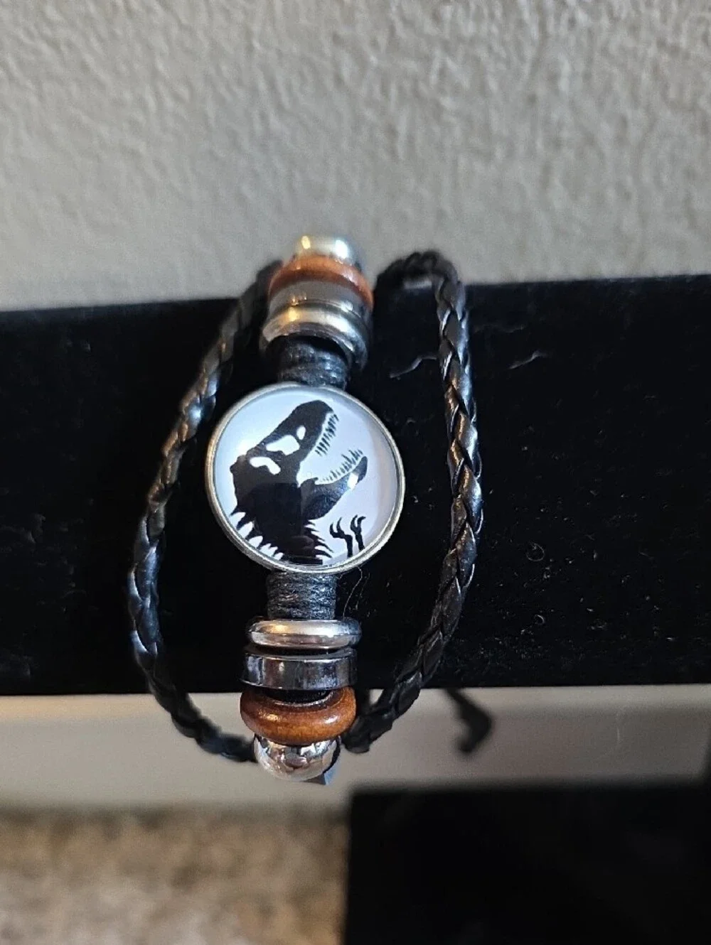 Black Leather Braided Men’s Bracelet with Dino Emblem